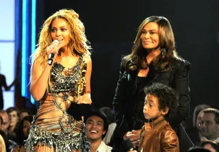 This Millenium Diva - May 22, 2011 - After that stunning performance at the Billboard Awards, Beyoncé's mother, Tina Knowles, walked onstage with her nephew Julez to present her with the Millennium Award. Beyonce was obviously touched, and even humbled. Goes to show all these other R&amp;B ladies that a real diva has humility.(Photo: Getty Images for ABC)