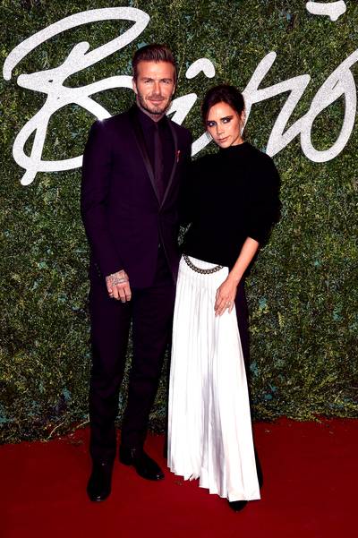 David and Victoria Beckham - The dynamic fashion duo first met after &nbsp;David saw Victoria in the video for the Spice Girls' song, &quot;Say You'll Be There.&quot;(Photo: Pascal Le Segretain/Getty Images)