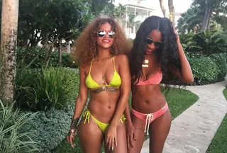 Rihanna and Melissa Forde -  The “B**** Better Have My Money” singer and her BFF hit up their native Barbados in coordinating neon two-piece suits, loose waves, and gold body chains. #Slayed  (Photo: Rihanna via Instagram)