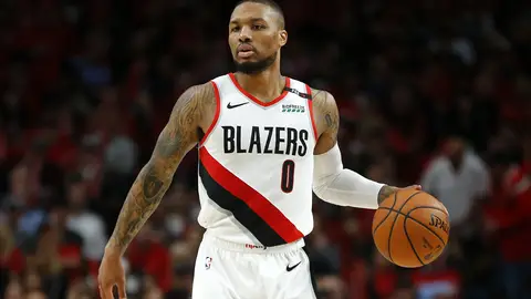 PORTLAND, OREGON - MAY 20: Damian Lillard #0 of the Portland Trail Blazers handles the ball during the second half against the Golden State Warriors in game four of the NBA Western Conference Finals at Moda Center on May 20, 2019 in Portland, Oregon. NOTE TO USER: User expressly acknowledges and agrees that, by downloading and or using this photograph, User is consenting to the terms and conditions of the Getty Images License Agreement. (Photo by Jonathan Ferrey/Getty Images)
