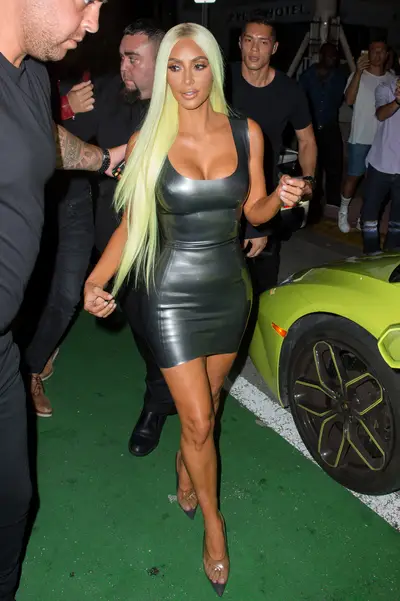 Kim Kardashian-West - Okay, Kim! Kim K says she doesn't like wigs but she stepped out looking just like her baby sister Kylie Jenner in this neon green wig (Photo: Splash News)
