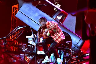 Riding Dirty - Travis Scott pulls up in a new ride!&nbsp; (Photo: Paras Griffin/BET/Getty Images for BET Networks)