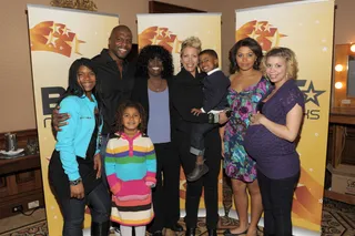 Crews Pose - Terry Crews and his family stop to take a picture with BET President of Programming Loretha Jones. (Photo: Mark Davis/PictureGroup)