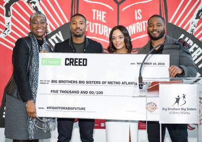 Do Gooder - Not only is Jordan fine, but he also has a big heart. Jordan, along with co-star Tessa Thompson and director Ryan Coogler, presented Big Brothers Big Sisters President/CEO Janice McKenzie-Crayton a check to help towards inspiring and assisting at-risk youth.  (Photo: Marcus Ingram/Getty Images for Allied)