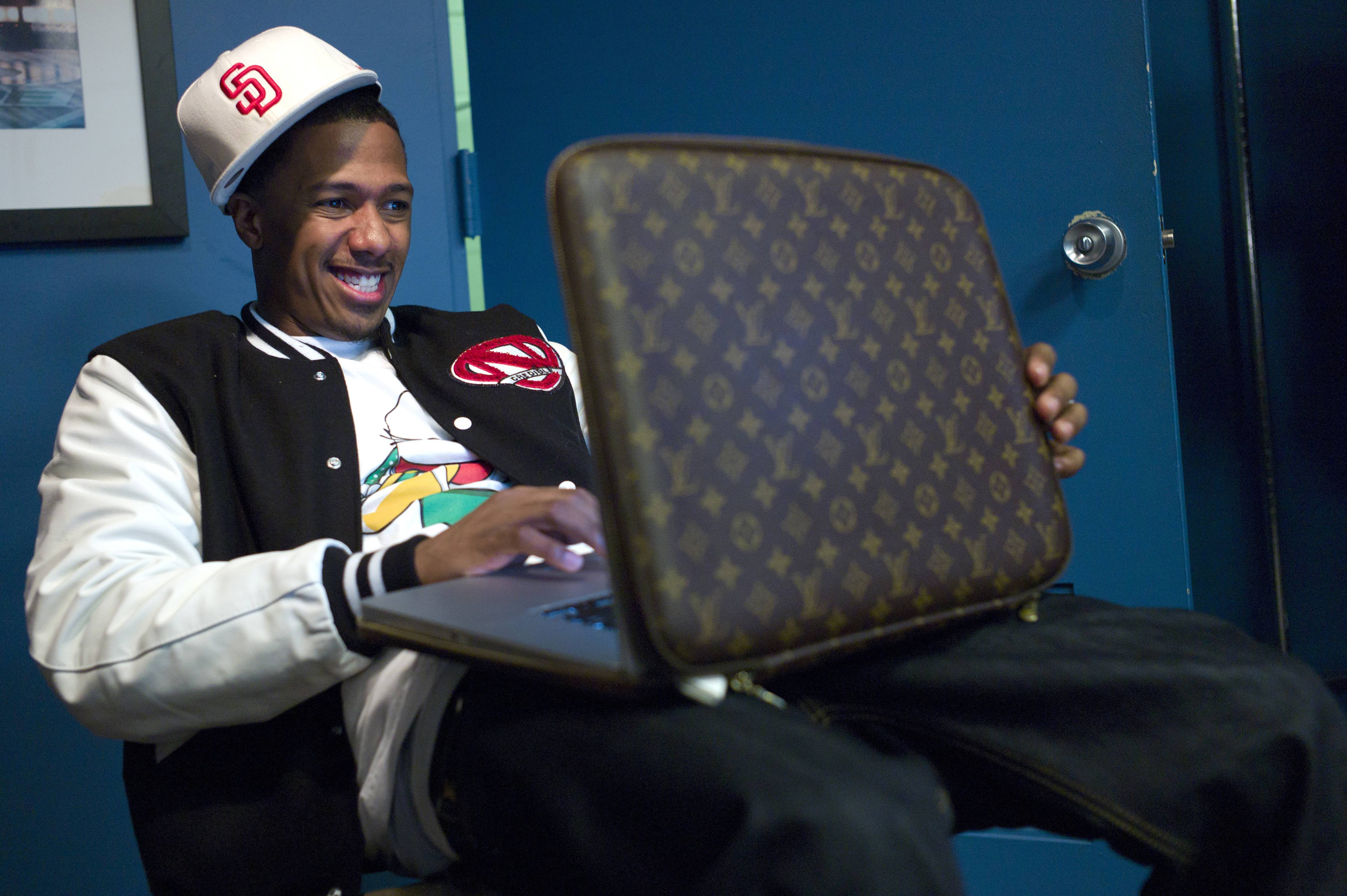 Nice Louis Vutton Laptop Case - Nick Cannon, on his Macbook backstage at BET's 106 &amp; Park at BET Studios on September 19, 2011, in New York City. (Photo: John Ricard / BET)