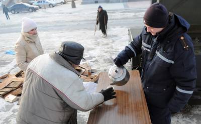 Over 60 Dead From East European Cold - While many U.S. states are enjoying mild winter weather, more than 60 people have died from cold temperatures in Eastern Europe, forcing some countries to call in military help to secure food and medical supplies and set up emergency shelters.(Photo: YURIY DYACHYSHYN/AFP/Getty Images)