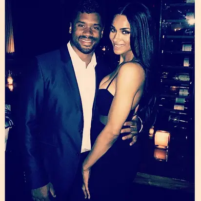 Ciara and husband Russell Wilson look loved-up at basketball match