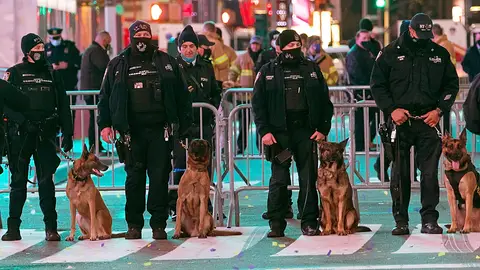 NYPD K-9 police officers are seen in Times Square on New Year's Eve on December 31, 2020 in New York City.  
