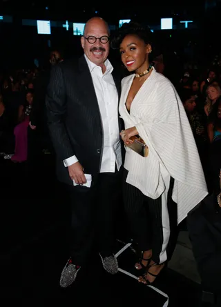 Airplay - Radio legend Tom Joyner spends some time with Janelle Monae during the show. (Photo: Johnny Nunez/BET/Getty Images for BET)