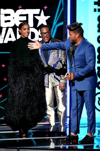 Anthony Anderson May Be the Best New Artist  - Why does Sam Smith look like Anthony Anderson? Host Anthony Anderson accepts the trophy for Best New Artist on behalf of Sam Smith. (Photo by Mark Davis/BET/Getty Images for BET)