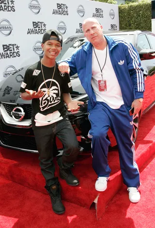 DJ Kid and Steve Lobel - You can’t go wrong with either of these looks! We’re talking all-black everything head-to-toe and a royal blue Adidas tracksuit. Classics!&nbsp; (Photo: Maury Phillips/BET/Getty Images for BET)