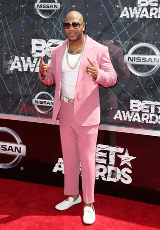 Flo Rida - The rapper is decked out in a mostly pink ensemble that only he can pull off!&nbsp;&nbsp;  (Photo: Frederick M. Brown/Getty Images for BET)