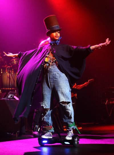 Picture Me Rollin' - Erykah Badu salutes the audience as she entered the stage on an IO Hawk. Oh, by the way, she performed her entire set on wheels.(Photo: Leon Bennett/BET/Getty Images for BET)
