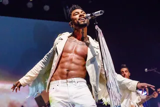 Croon and Swoon - Miguel bares his soul and his chest while performing on stage at the Joy Theater in New Orleans.(Photo: Josh Brasted/Getty Images)