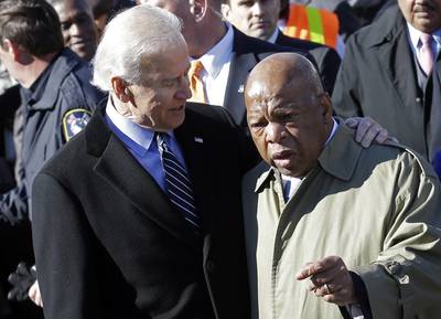 Isn't It Ironic? - As Lewis and Biden prepare to lead a group across the Edmund Pettus Bridge to commemorate a march for Black voting rights, a key provision of the 1965 Voting Rights Act is under attack.  (Photo: AP Photo/Dave Martin)