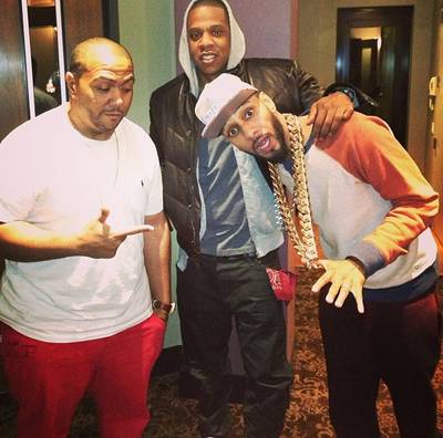 Swiss Beatz @therealswizzz - Swizz Beatz gets silly trying on Jay-Z’s 5 Kilo gold chain as Timbaland waits his turn. (Photo: instagram/therealswizzz)