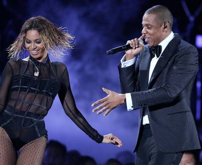 Drunk in Love - At the 2014 Grammys, Bey’s Nichole de Carle bodysuit, custom La Perla bra and Saint Laurent tights definitely set the mood for her sultry performance of “Drunk in Love” with Jay. Our vote? Absolutely stunning. (Photo: Matt Sayles/Invision/AP)