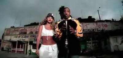On the Run - These two had us all jonesing for tracksuits and snapbacks after watching the video for Hov’s hit, “‘03 Bonnie and Clyde.”  (Photo: Roc-A-Fella Records)