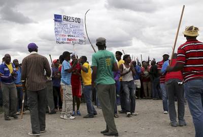 Talks in South Africa Platinum Strikes Resume - In South Africa, the government resumed talks in ending a strike by platinum miners who are demanding higher wages from their company, Anglo American Platinum Ltd. The protests have had a negative effect on the country’s economy since beginning last week.&nbsp;&nbsp;(Photo:&nbsp;REUTERS/Siphiwe Sibeko)