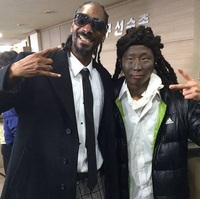 Snoop @snoopdogg - Snoop Dogg brings in a questionable looking &quot;stunt double&quot; for a video he's filming overseas. Lately, blackface has been getting a lot of stars into some serious trouble with the press. Judging from the comments posted, his fans weren't pleased with the pic either.(Photo: Snoop Dogg via Instagram)