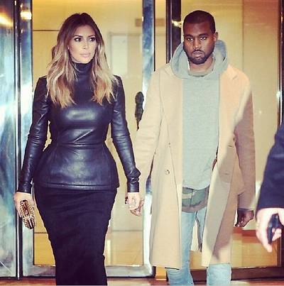 Kim Kardashian @kimkardashian - Kim posts a pic of her and her boo, Kanye West, in designer duds while enjoying Paris Fashion Week. Yeezy, on the other hand, looks a little less thrilled.(Photo: Kim Kardashian via Instagram)