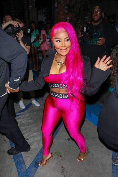 Lil’ Kim - The &quot;Queen Bee&quot; is always finding new ways to set a trend!&nbsp;Lil’ Kim&nbsp;was spotted heading out of&nbsp;Megan Thee Stallion’s BET after-party in a sexy two-piece by Dolce and Gabbana. The fashion trendsetter paired her hot pink outfit with&nbsp;Kandee's 24ct Gold Croc Mules and long pink tresses that she expertly paired with her look. We love the monochromatic look!&nbsp; (Photo: The Daily Stardust / BACKGRID)