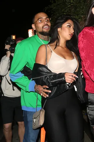 Chris Brown&nbsp;and mystery lady - Breezy was spotted at the Poppy club in LA to party with a&nbsp; female companion.&nbsp;(Photo: Splash) (Photo: Splash)