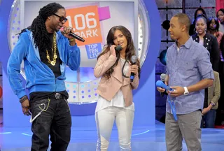 Call Me - 2 Chainz hooks up Terrence J and Rocsi Diaz with their very own FLX Phone at 106 &amp; Park, February 23, 2012.(Photo: John Ricard / BET)