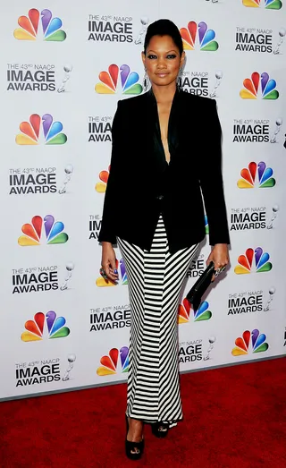 Garcelle Beauvais - The actress worked the NAACP red carpet looking like a fly chapter president in this smart blazer and striped dress combo. (Photo: Scott Kirkland/PictureGroup)