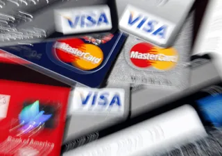 What Are the Advantages of Prepaid Cards? - Prepaid&nbsp;cards are a parallel, relatively low-cost way to bank for people who cannot open a traditional account because they distrust financial firms, don't have appropriate identification, or cannot qualify to open an account. Prepaid&nbsp;card customers can get access to thousands of ATMs, use major payment systems to buy goods, and even use online bill pay services. Prepaid&nbsp;cards are also attractive because the other options for &quot;unbanked&quot; people, like check cashing or money order stores, can be more expensive. Carrying cash can be risky because it is hard to trace and recover in cases of theft. (Photo: Danny Moloshok/Landov)