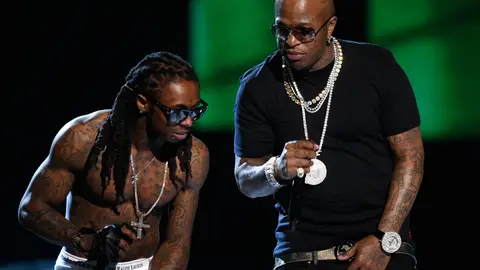 Family Affair - The bond between Baby and Lil' Wayne is deeper than rap. From the start of Cash Money Records rise in late 1990s the Birdman has always touted his young understudy as a future hip hop great. In return, Weezy, a.k.a Birdman Jr., has never been shy about expressing his affection for his musical daddy. And now the two are the bosses of one of hip hop's most powerful crews, Cash Money/Young Money.(Photo by Kevin Winter/Getty Images)