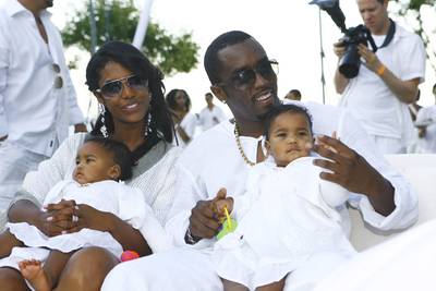 Diddy and Kim Porter - Diddy and Kim Porter welcomed their twin girls into the world like only Diddy knows how...with a party. The theme of the occasion was a &quot;Little Miss Diddy Pretty in Pink&quot;&nbsp;affair where guest dined on things like custom pink M&amp;Ms, pink cocktails and Perrier Jouet pink champagne.    (Photo: Mat Szwajkos/CP/Getty Images for CP)&nbsp;