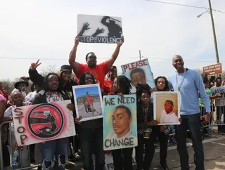 Advocating for Change - John Salley posed for a quick snap with protesters as they marched against police brutality and gun violence.(Photo: Johnny Nunez/BET)