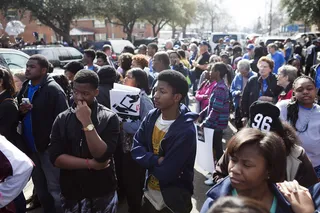 Anticipating - Young people await the start of the church service.&nbsp;(Photo: Ty Wright/BET)