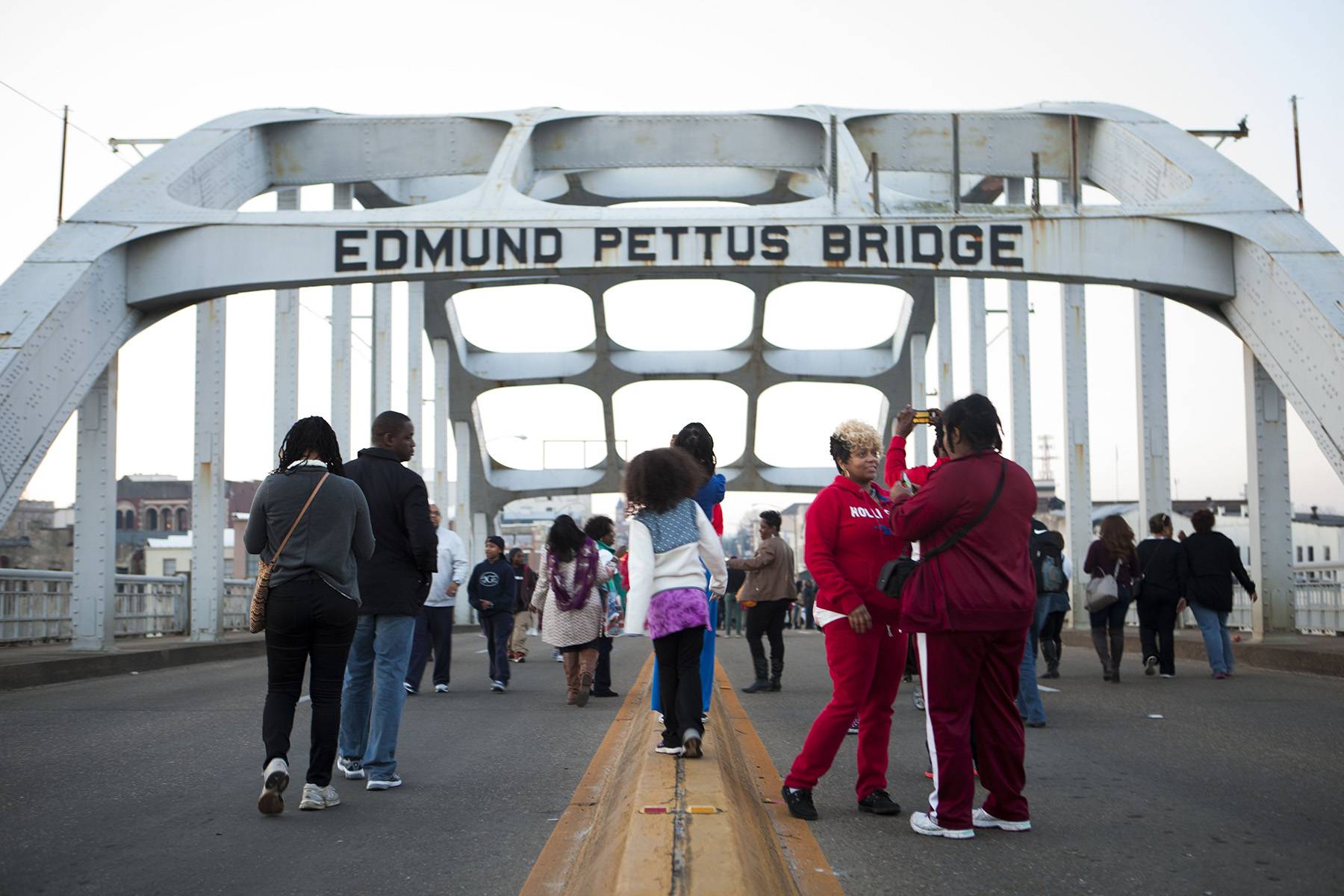 SELMA, ALABAMA  MARCH 5, 2015:

People gather on the Edmund Pettus Bridge after President Obama's speech on March 7, 2015.  (Photo: Ty Wright for BET)