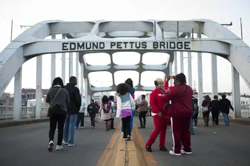 SELMA, ALABAMA  MARCH 5, 2015:

People gather on the Edmund Pettus Bridge after President Obama's speech on March 7, 2015.  (Photo: Ty Wright for BET)