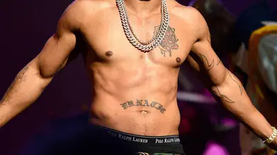 Whoa, Baby! - For hardcore stans, the tattoo will be a dead giveaway as to which frequently-shirtless rapper these abs belong.&nbsp; (Photo: Prince Williams/Getty Images)