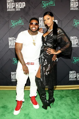 Back On It - Rapper Lil Scrappy and girlfriend Bambi look like they're back on again! Scrappy is all smiles as Bambi shows off her model swag. (Photo: Bennett Raglin/BET/Getty Images for BET Networks)