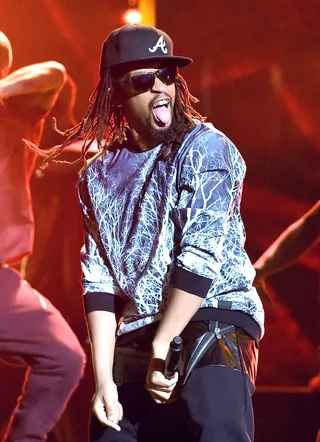 What?! OK! - Recording artist Lil Jon gets loose onstage during Telemundo's Latin American Music Awards at the Dolby Theatre in Hollywood.(Photo: Kevin Winter/Getty Images)
