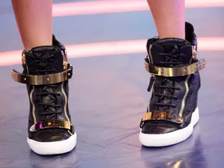 Black and Gold - Keshia Chante rocks some shiny sneaks while on 106. (Photo: Bennett Raglin/BET/Getty Images for BET)