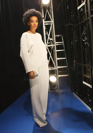 Style Star - Solange poses backstage against a backdrop of lights. (Photo: Bennett Raglin/BET/Getty Images for BET)