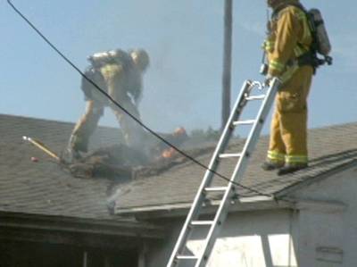 Ventilate - Halvo opens the roof to expose the flames inside the house.