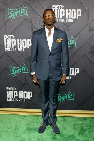 Rich Forever - Rich Homie Quan is decked out in a suit that makes him look like, literally, one of your rich homies.(Photo: Bennett Raglin/BET/Getty Images for BET Networks)