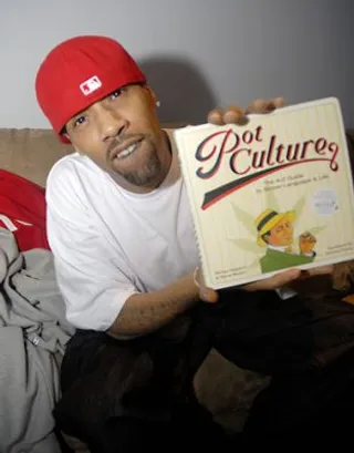 Behind The Scenes - Redman shows off his Pot Culture book.  Wonder what he did on his lunch break???