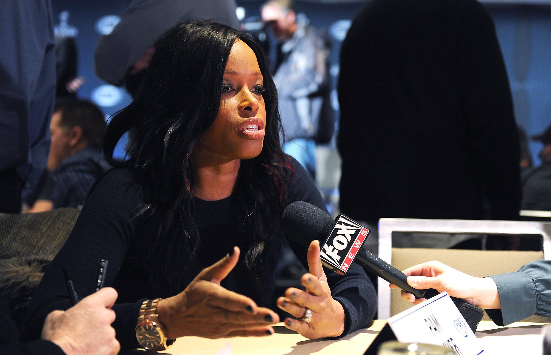 FOX sports sideline reporter Pam Oliver reports on the field after