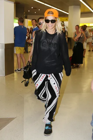 Wild Child - Rita Ora&nbsp;rocks a funky outfit as she arrives at Tegel airport in Germany to attend Michalsky StyleNite during Mercedes-Benz Fashion Week Berlin.&nbsp;(Photo: WENN.com)