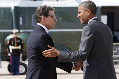 Know When to Hold 'Em - Texas Gov. Rick Perry greeted the president on the tarmac in Dallas after initially declining to do so. The former and potential 2016 presidential candidate had been pushing for Obama to meet with him privately and to visit the border, which the White House resisted. In the end, the administration invited Perry to join the round-table discussion with local leaders. The president delivered a statement on the border crisis after the meeting.   (Photo: AP Photo/Jacquelyn Martin)