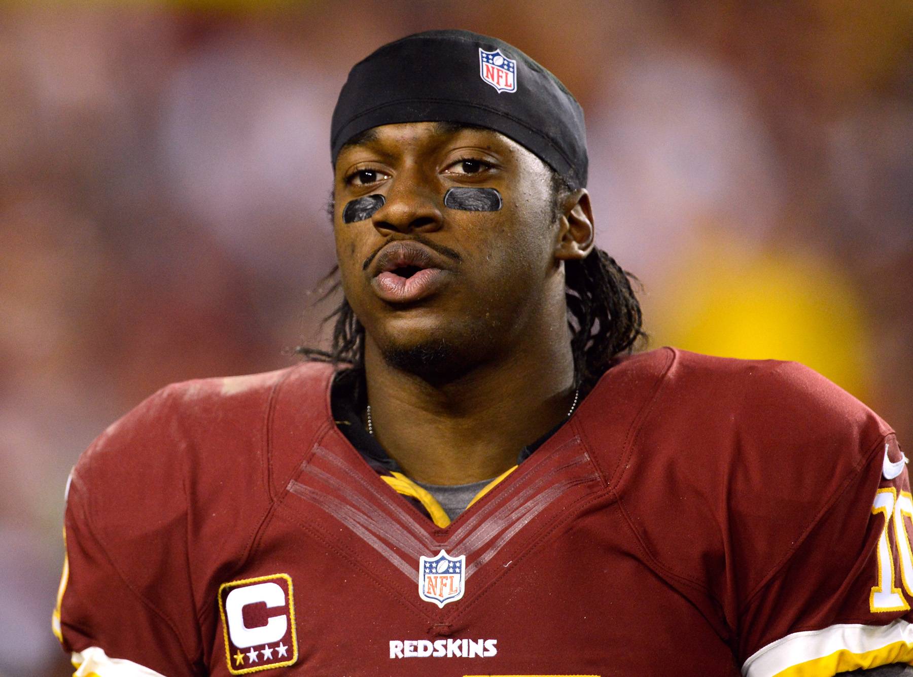 RGIII Benched, Coach Says Too Many Hits