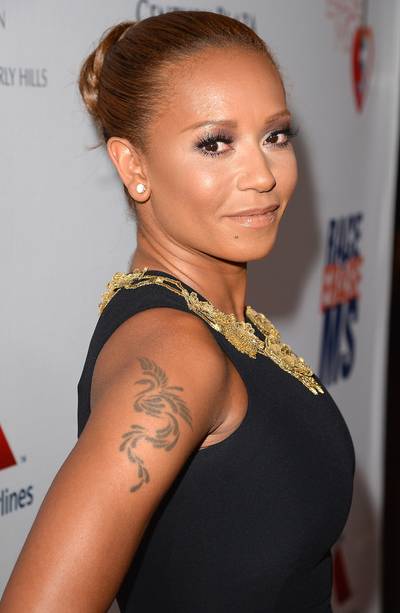 Melanie Brown: May 29 - The former Spice Girl turns 38. (Photo: Jason Merritt/Getty Images for Race To Erase MS)