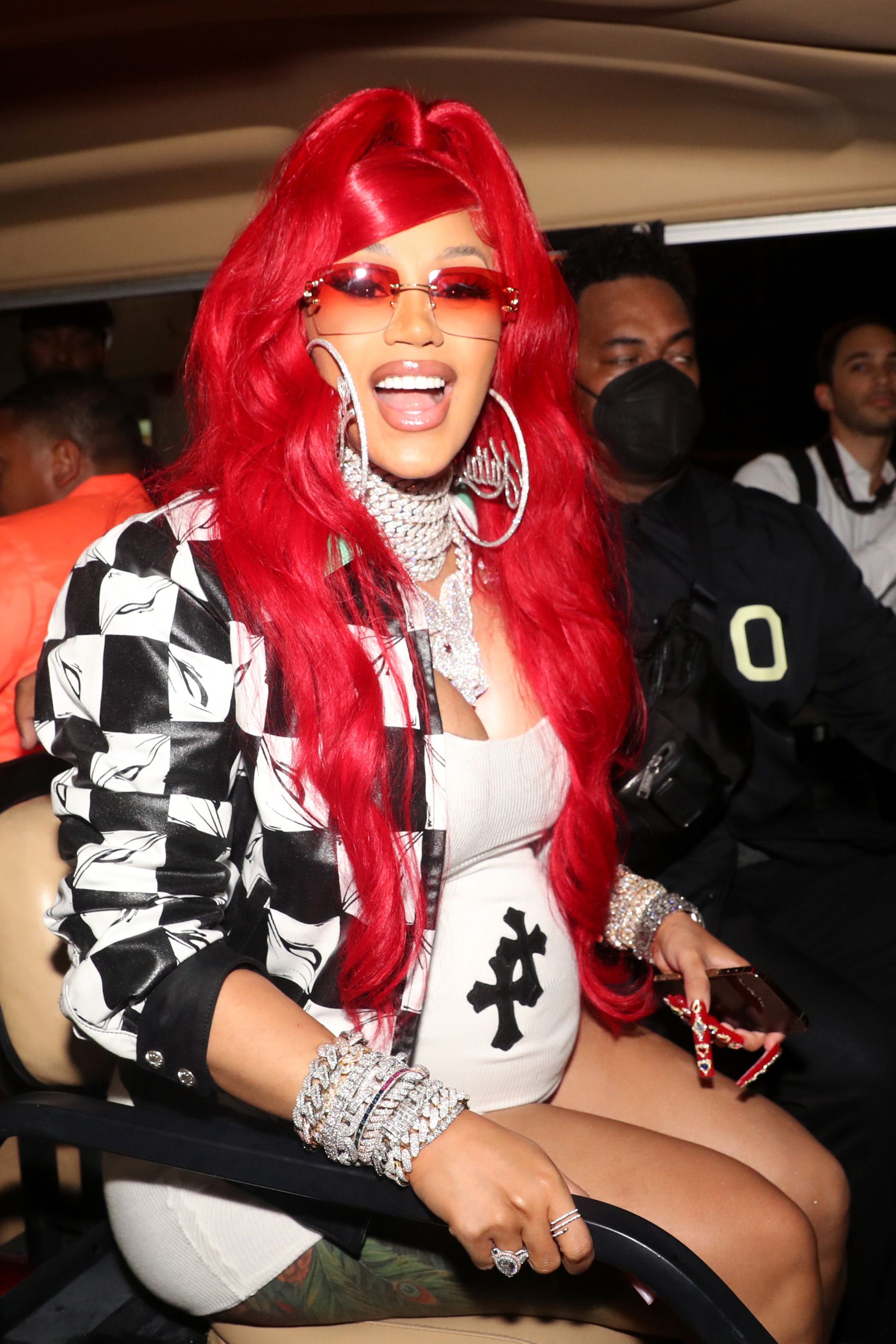Hot 97's Summer Jam 2021 - Cardi B&nbsp;showed off her growing baby bump while performing with her husband&nbsp;Offset&nbsp;and rap group&nbsp;Migos&nbsp;at Hot 97's Summer Jam 2021. Behind the scenes, the pregnant rapper snapped this photo rocking a short T-shirt dress with a black-and-white checkered bomber jacket. The Bronx native completed her look with bright red hair and layers of diamond bling.&nbsp;This makes baby no. 2 for Cardi and Offset, who welcomed their daughter&nbsp;Kulture&nbsp;in 2018.&nbsp;We can't wait to see how the lovebirds celebrate their new addition. We also can't wait for more music and style from Cardi this year.(Photo by Johnny Nunez/WireImage) (Photo by Johnny Nunez/WireImage)